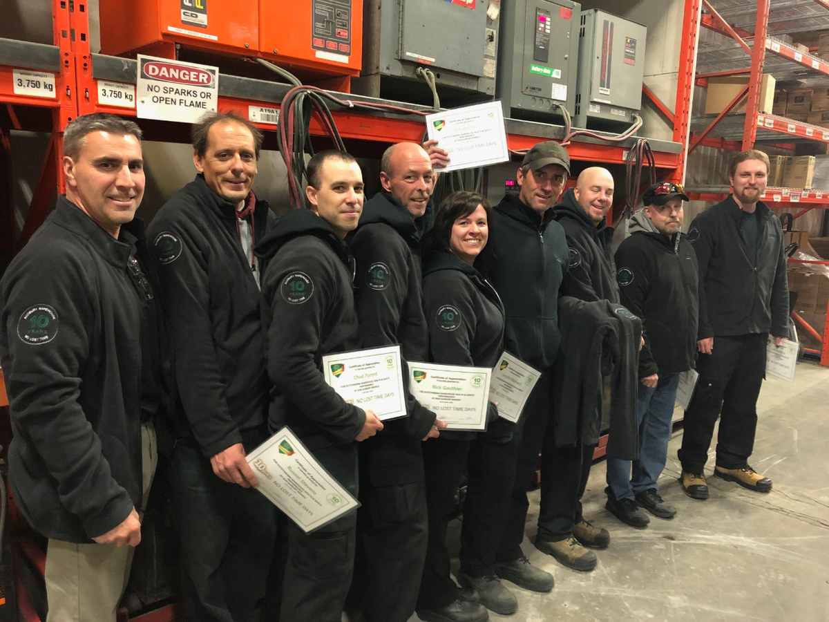 Flanagan Foodservice warehouse employees in matching Flanagan Foodservice warehouse employees